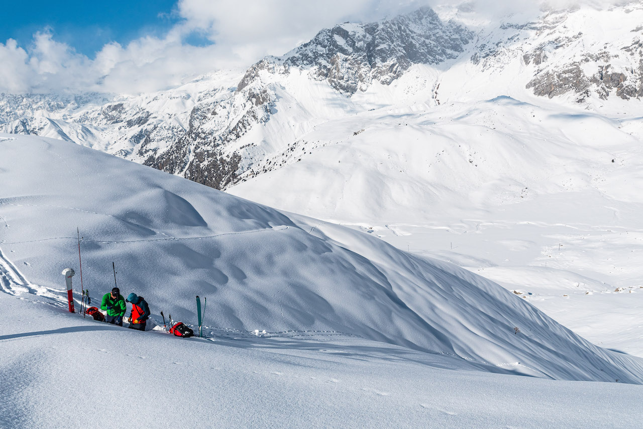 Digging into the faceted snowpack of the Tien Shan Mountains, Kyrgyzstan.